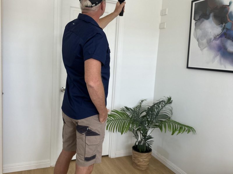 Stuart Slater using a thermal camera for a building inspection